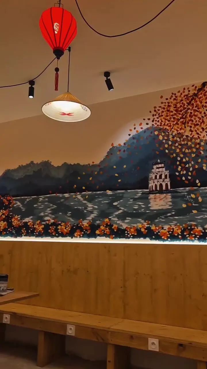 Détail de la fresque du lac de Hanoï : pagode et arbre aux feuilles rouges